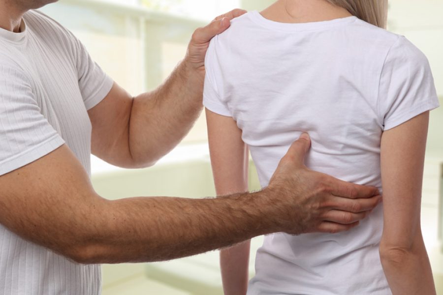 back-pain-osteopathic-adjustment-canberra-best-osteopath-woden-shutterstock_737916013