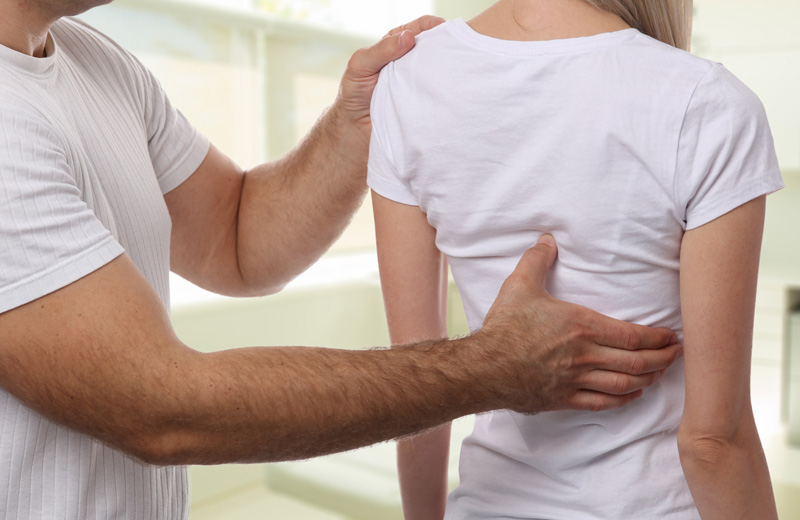 back-pain-osteopathic-adjustment-canberra-best-osteopath-woden-shutterstock_737916013